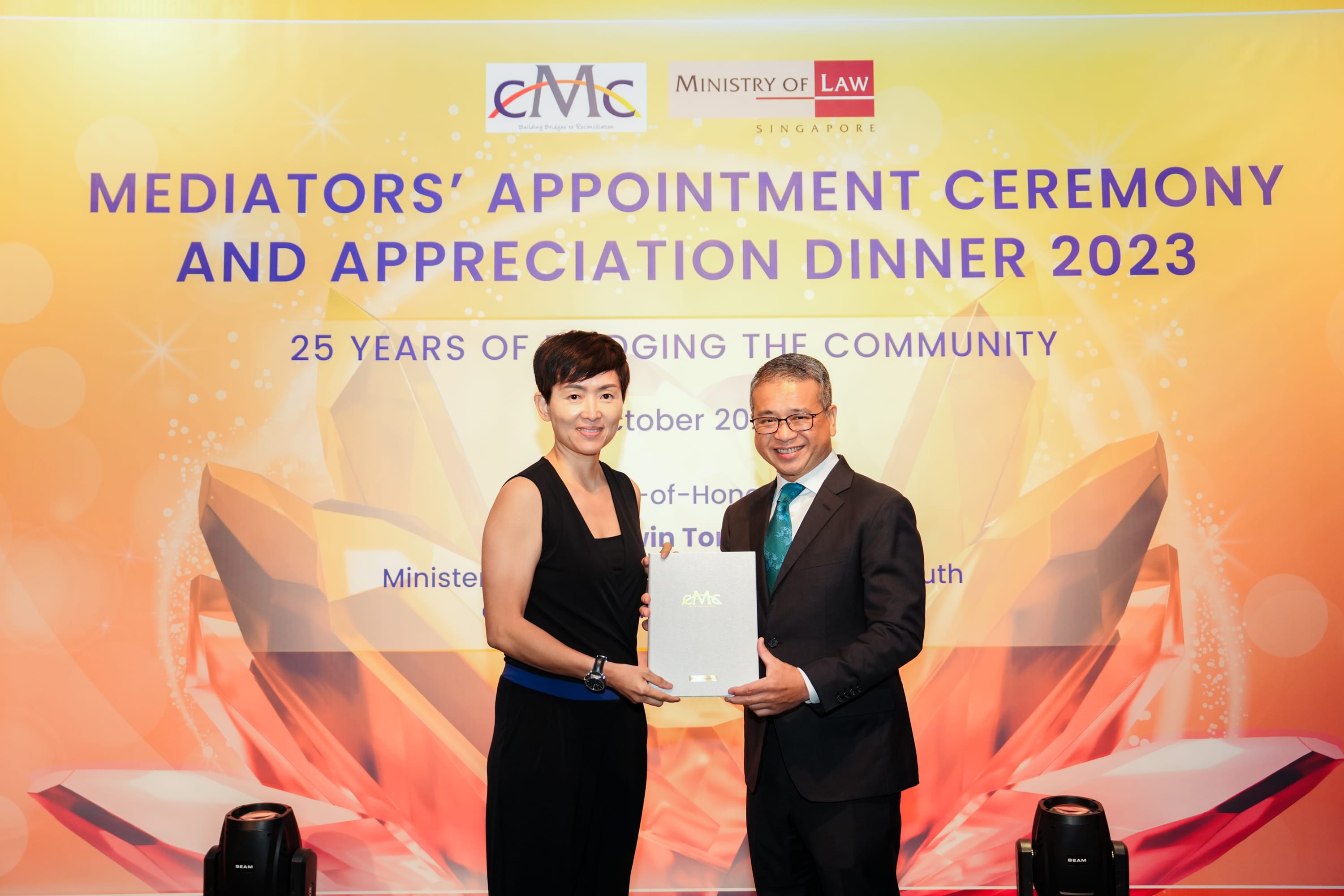 reappointment Image 4 award with Min Edwin